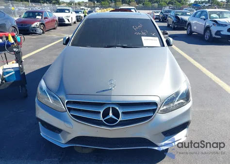 2014 Mercedes-Benz E 350 4Matic z USA, uszkodzony, nr VIN WDDHF8JB6EB029035